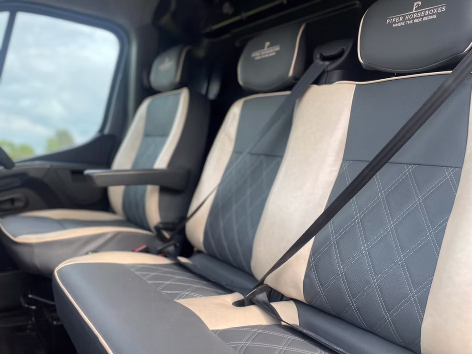 Luxury seating area inside a custom-built Piper Horseboxes Ltd horsebox in Lancashire.