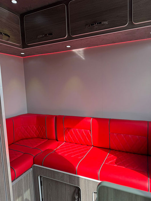Bright interior lighting for clear visibility in a Piper Horseboxes Ltd horsebox. Perfect for equestrian travel.