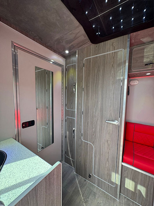 Warm LED lights creating a comfortable atmosphere inside Piper Horseboxes Ltd vehicles. Perfect for equestrian travel.