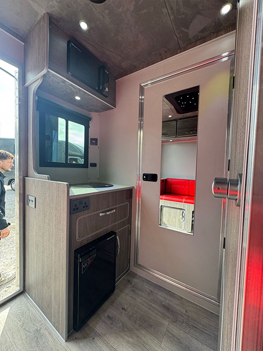 Integrated kitchen area in a Piper Horseboxes Ltd horsebox. Perfect for equestrian travel.