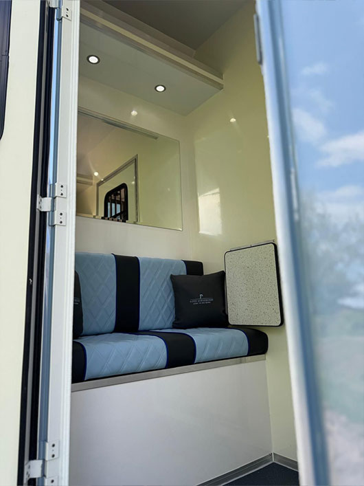 Comfortable resting area designed by Piper Horseboxes Ltd for riders and grooms. Perfect for equestrian travel.