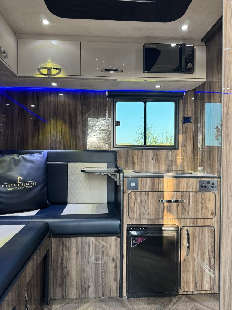 Warm LED lights creating a comfortable atmosphere inside Piper Horseboxes Ltd vehicles. Perfect for equestrian travel.