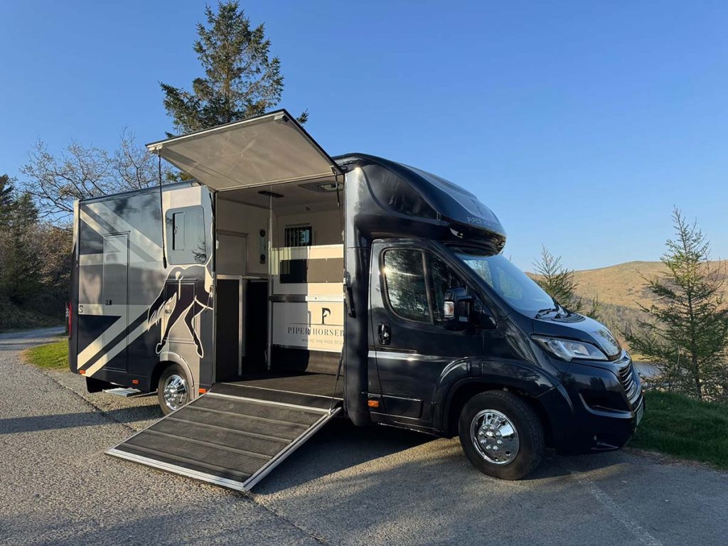 Modern horsebox with custom logo design of the side.