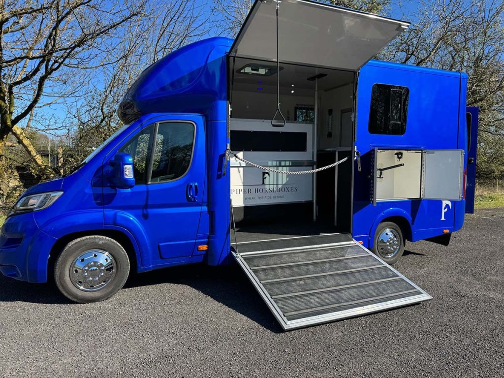 Blue horsebox with barrier