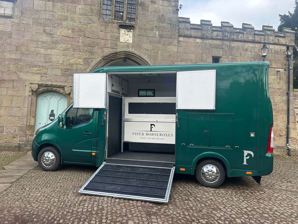 Racing green horsebox with ramp down