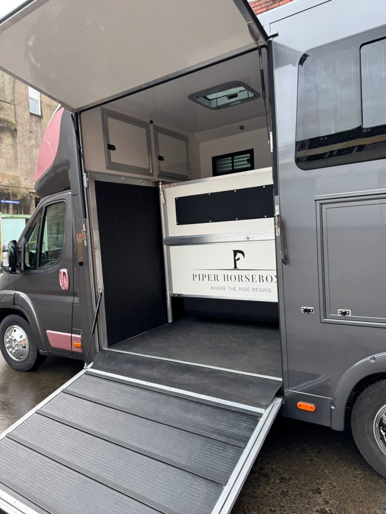 Secure horse transport system designed by Piper Horseboxes Ltd. Perfect for equestrian travel.