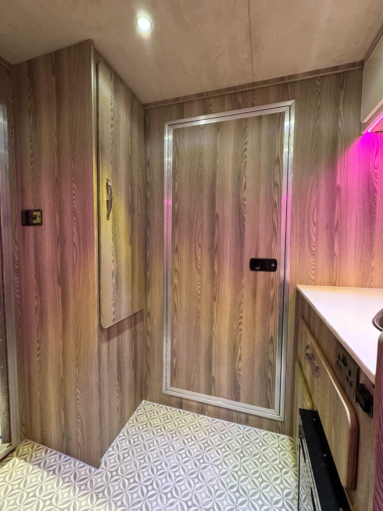 Pink lighting inside a Piper Horseboxes Ltd luxury horsebox. Perfect for equestrian travel.