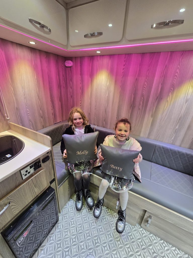 Molly and Betty showing off their pillows