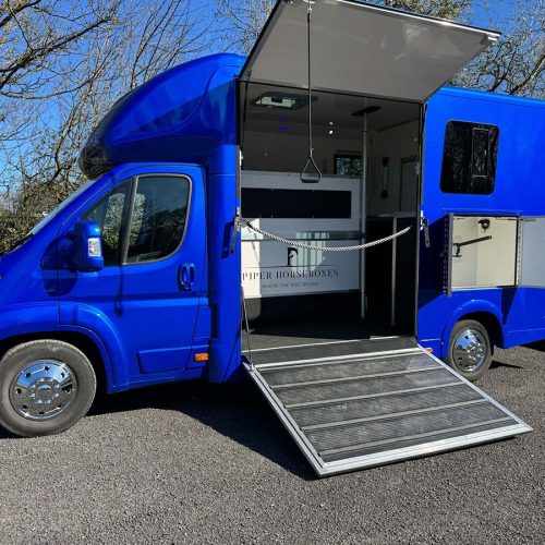 Blue horsebox with barrier