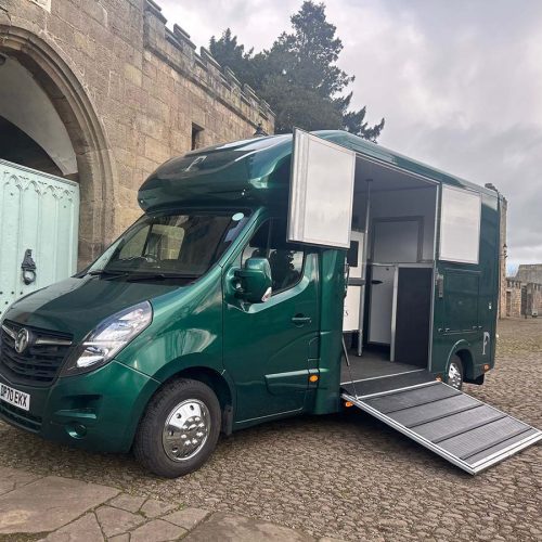Racing green horsebox with side ramp open