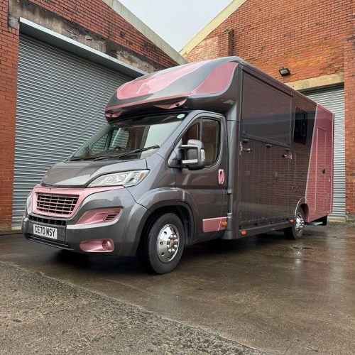 Piper Horseboxes Ltd logo featured on grey and pink modern horsebox design.