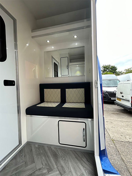 Integrated horse feeding area inside a Piper Horseboxes Ltd horsebox.